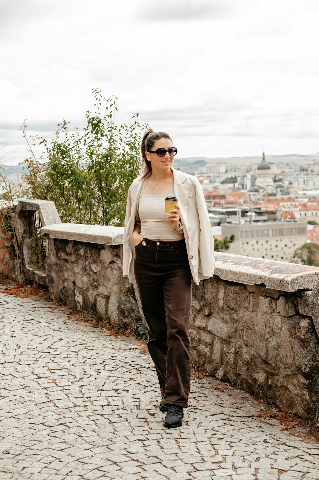 Portrait of a smiling Brazilian businesswoman in a blazer