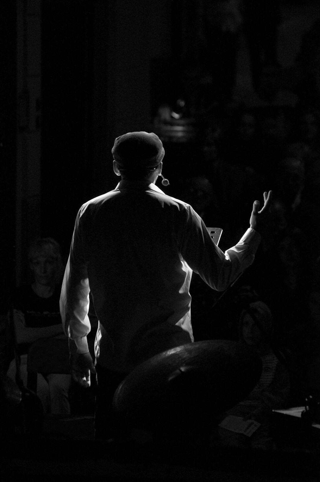 confident speaker on stage