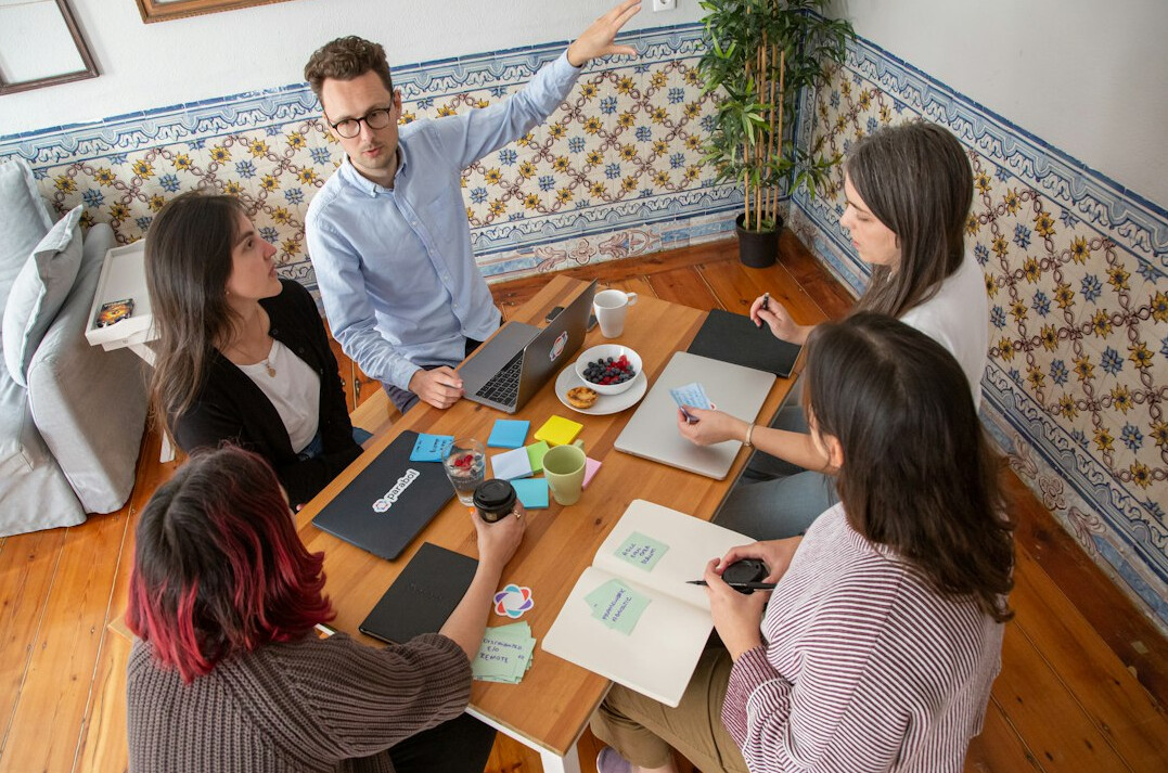 person leading team discussion