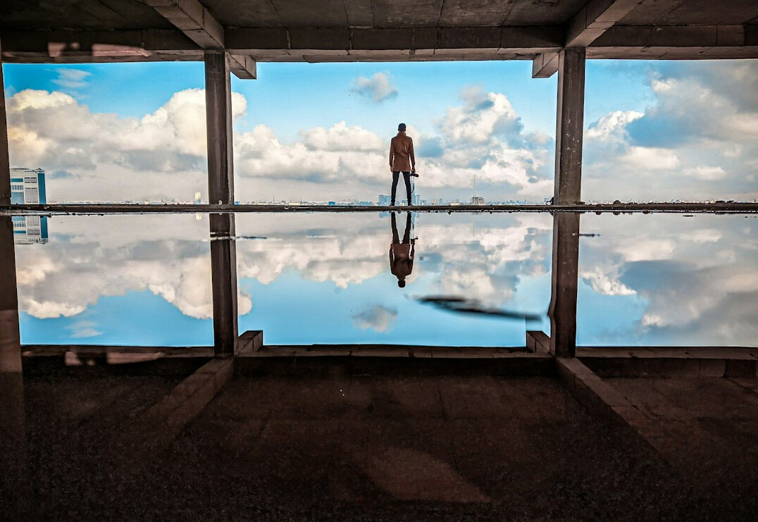 person reflecting on success