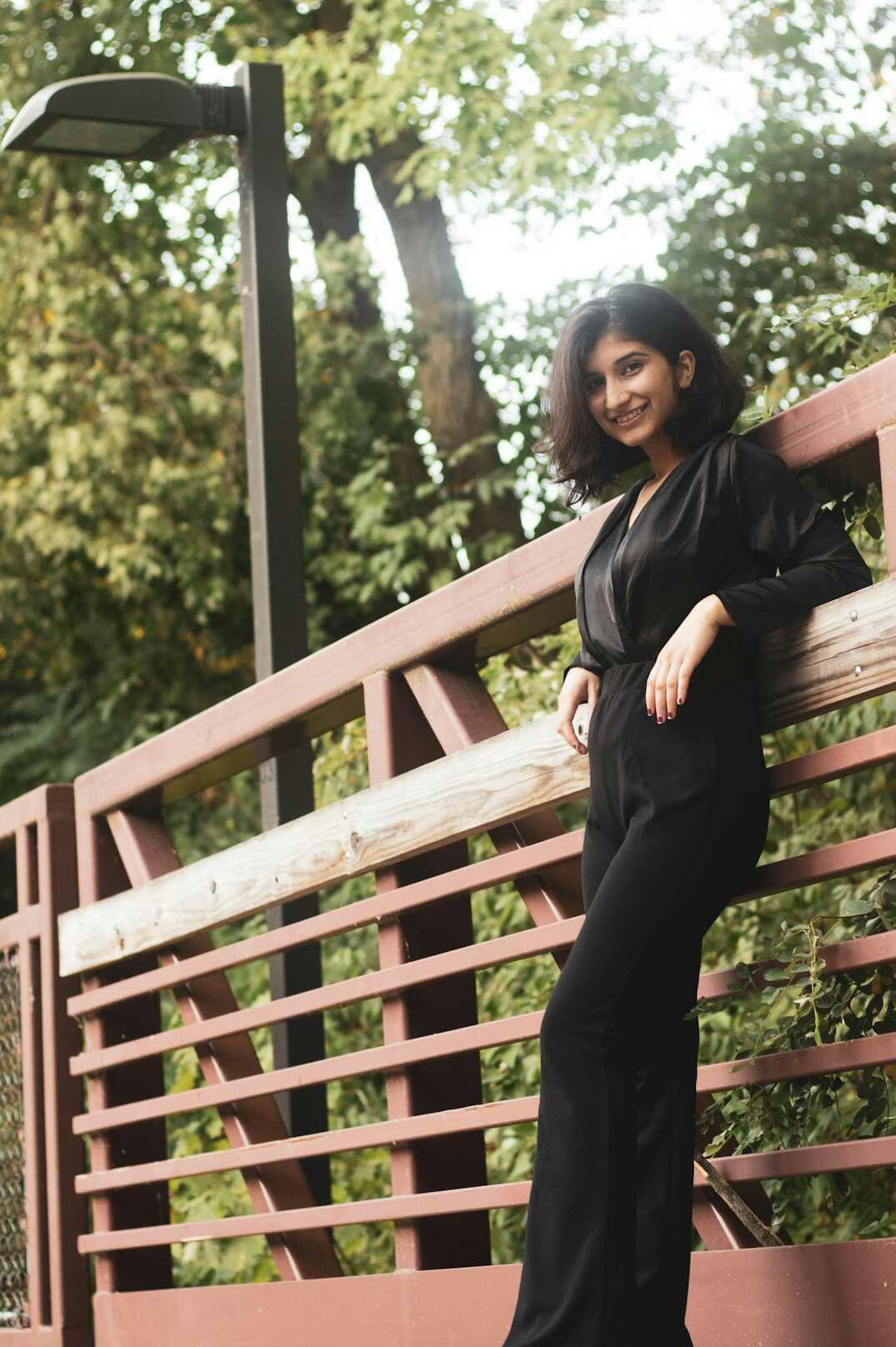 Professional woman in a dark blazer smiling